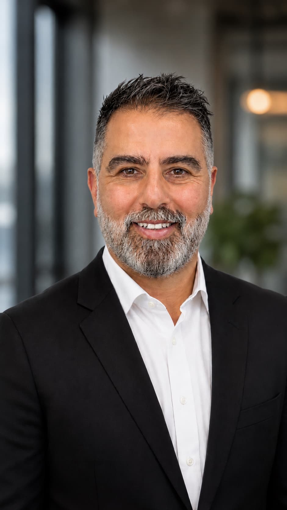 Sam Haragli, Director · ACT of Synergy Building Group